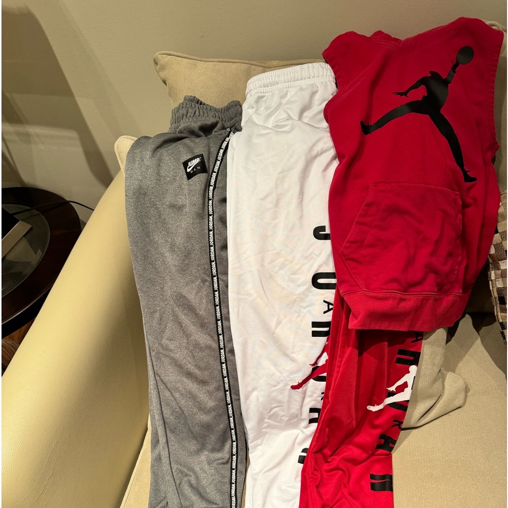3 Pair of Jordan Joggers and 1 Jordan sleeveless hoodie